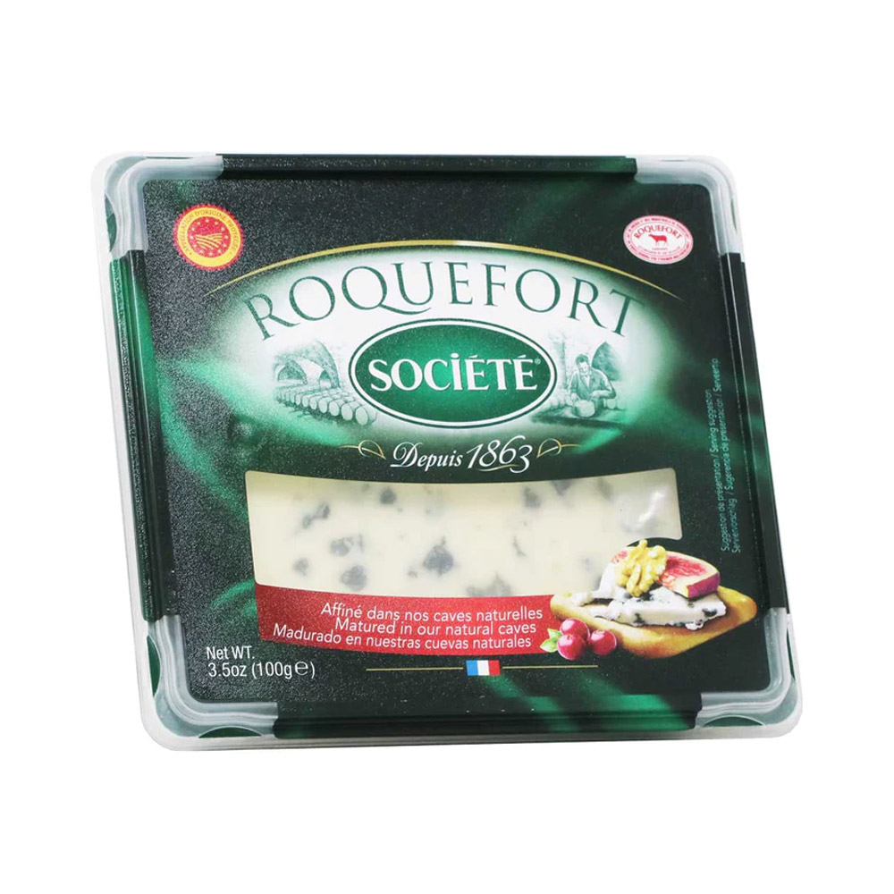 A wedge of Société Roquefort blue cheese in its packaging
