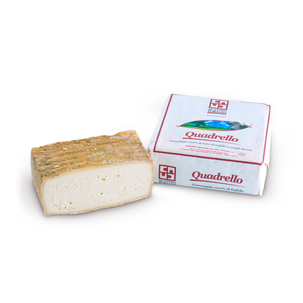 Square of Quattro Portoni quadrello di bufala cheese next to a packaged Quattro Portoni quadrello di bufala cheese