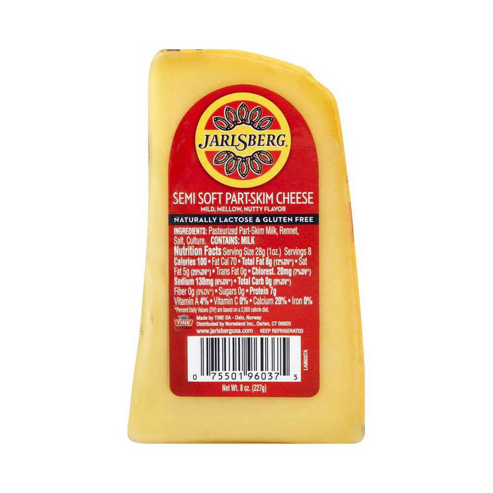 A wedge of Jarlsberg cheese in its packaging