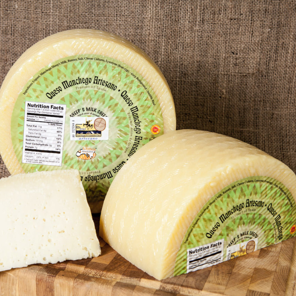 Wheel and half wheel of Mitica 4 Month DOP Manchego cheese