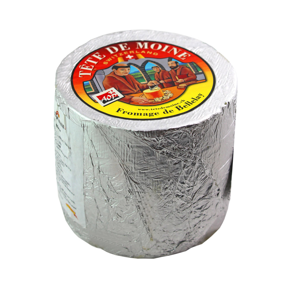 A wrapped wheel of Tête de Moine cheese