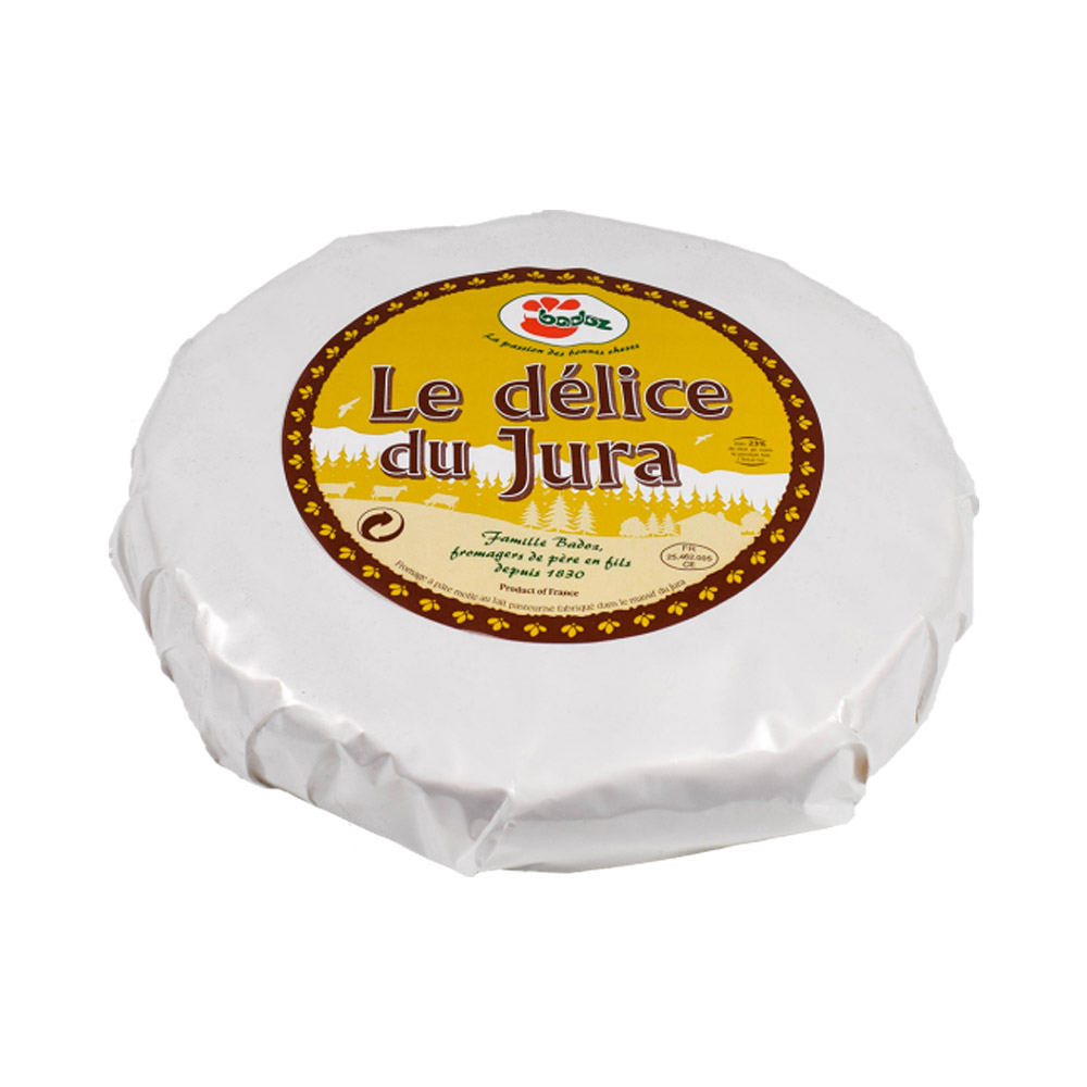 Wrapped wheel of Delice Du Jura cheese