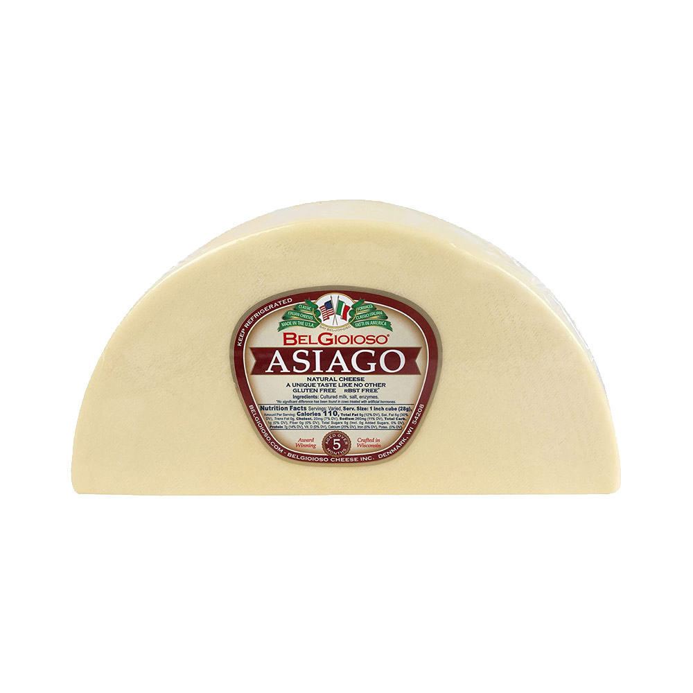 Half a wheel of BelGioioso Asiago cheese
