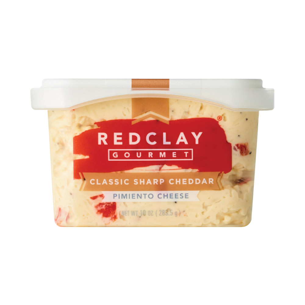 Container of Red Clay Gourmet sharp cheddar pimiento cheese