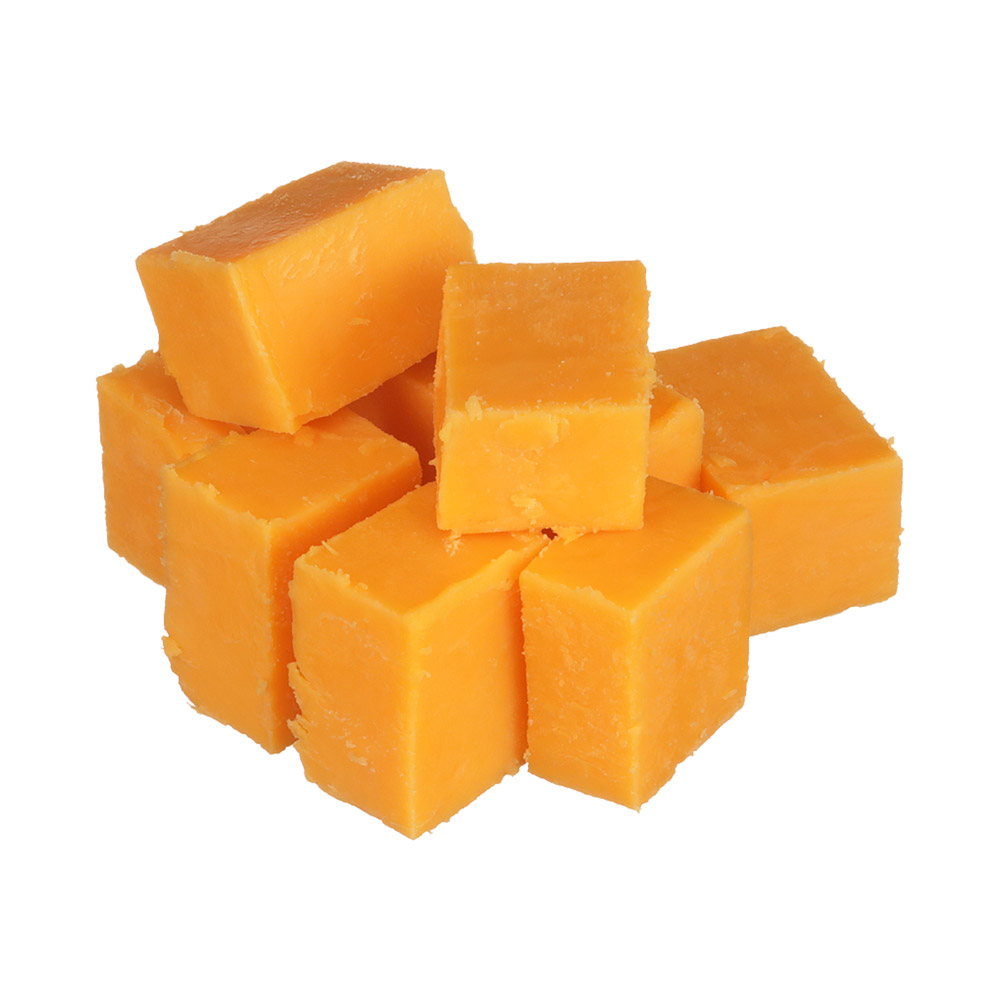 A pile of yellow cheddar cheese cubes