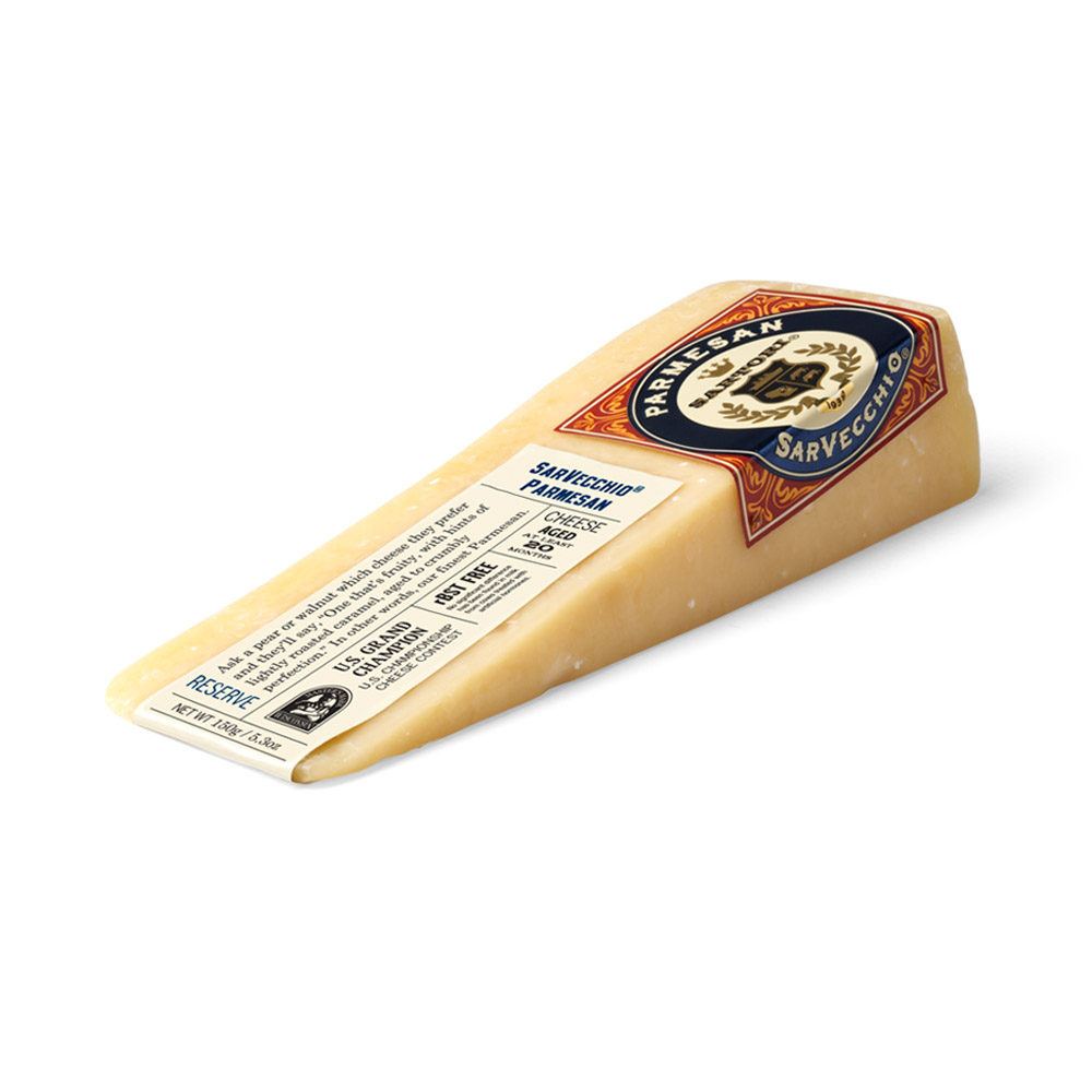 A wedge of Sartori SarVecchio Parmesan cheese