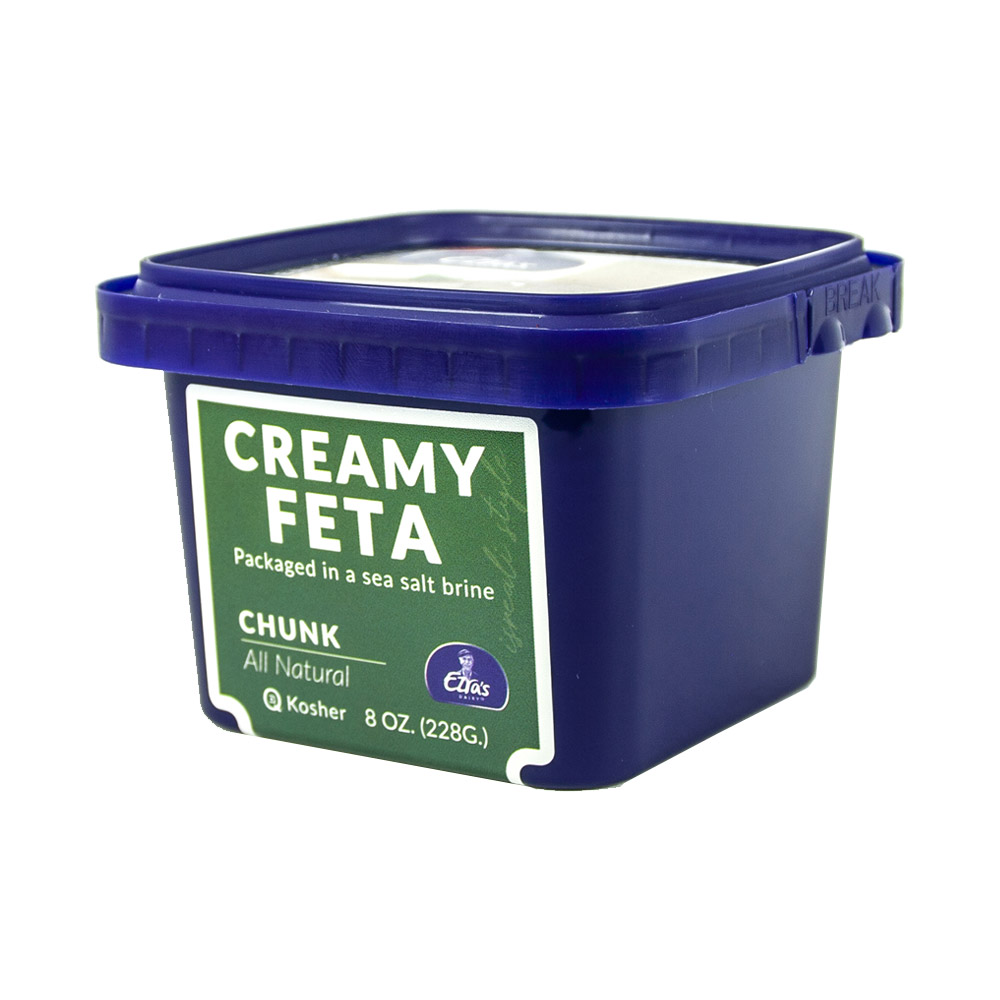 Container of Ezra's creamy all-natural feta cheese chunks