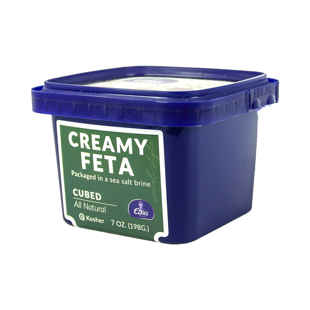Container of Ezra's creamy all-natural feta cheese cubes