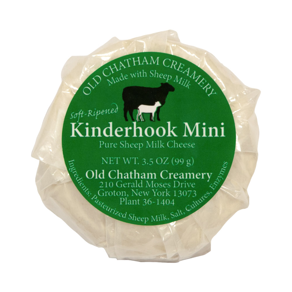 A piece of Old Chatham Creamery Mini Kinderhook Creek in it's packaging