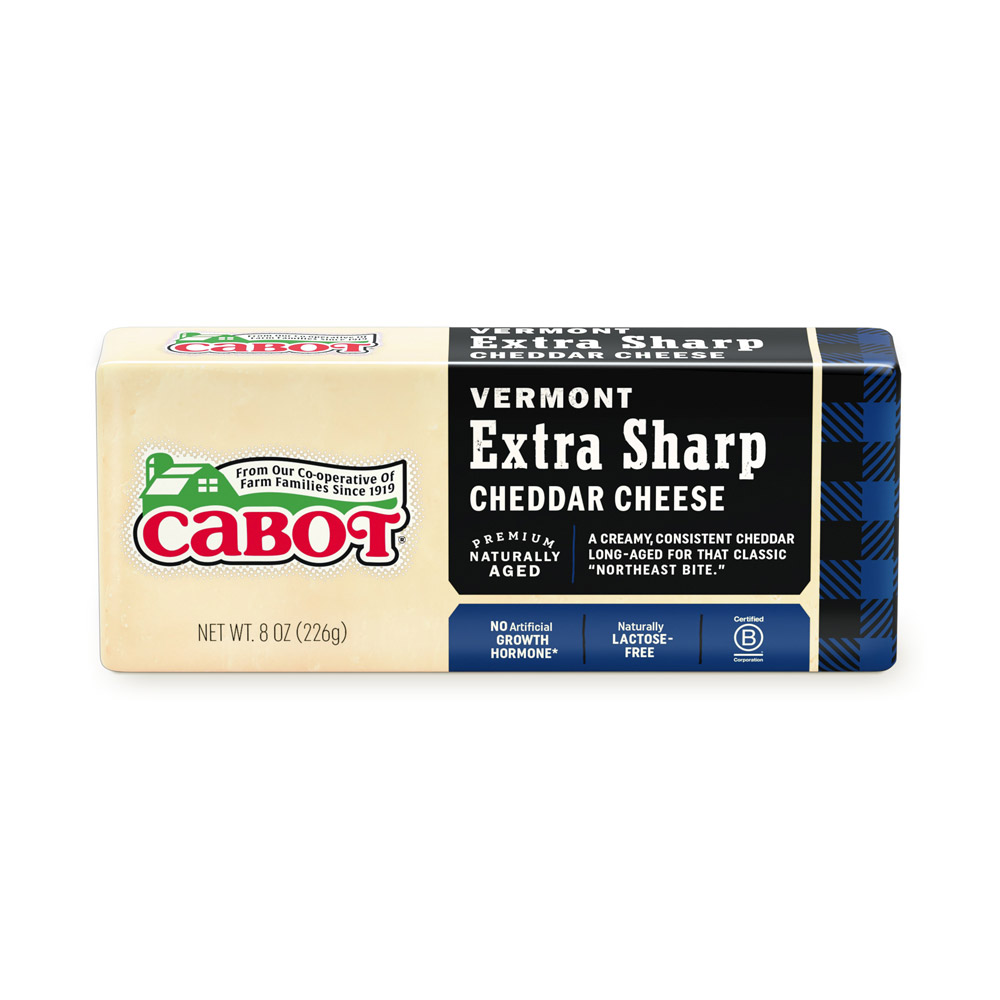 Bar of Cabot Vermont extra sharp white cheddar cheese in its packaging