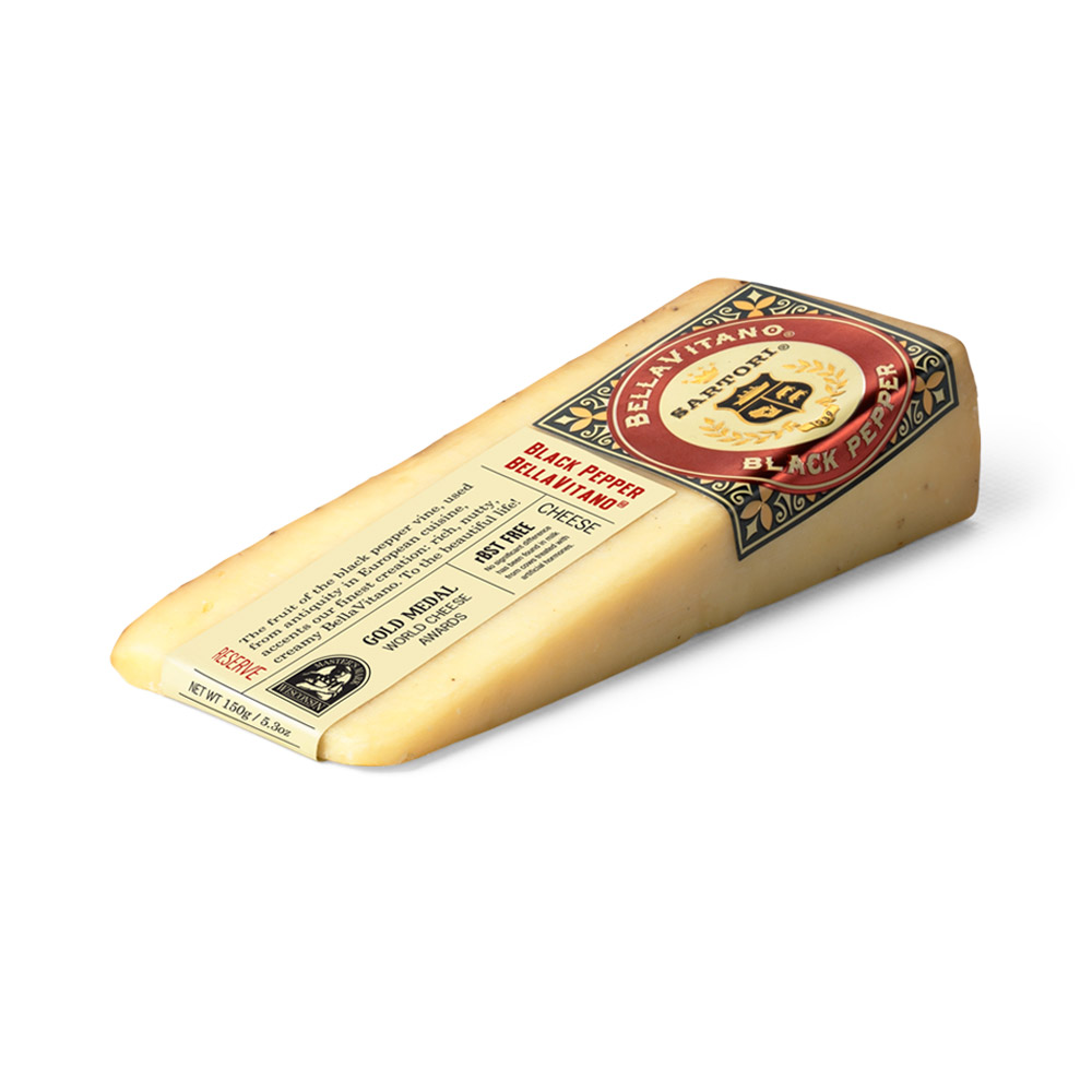 A wedge of Sartori Black Pepper BellaVitano cheese