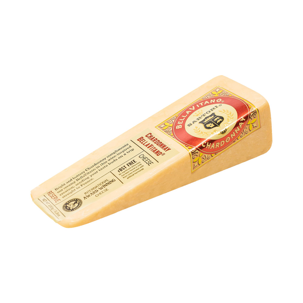 A wedge of Sartori Chardonnay BellaVitano cheese