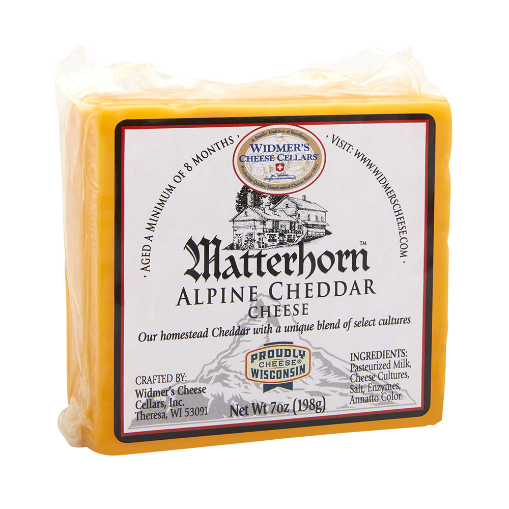 Retail cut of Widmer's Cheese Cellars Matterhorn Cheddar