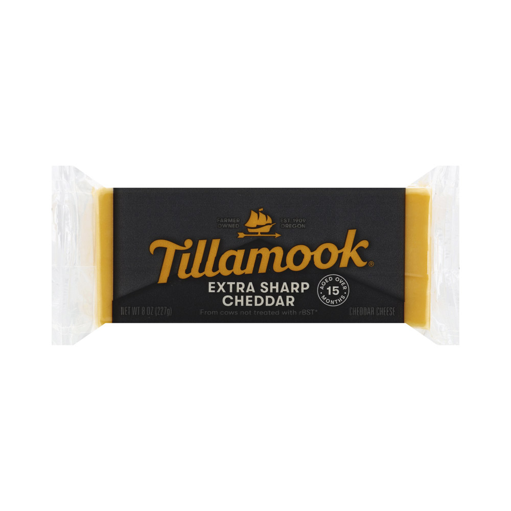 A bar of Tillamook extra sharp cheddar cheese