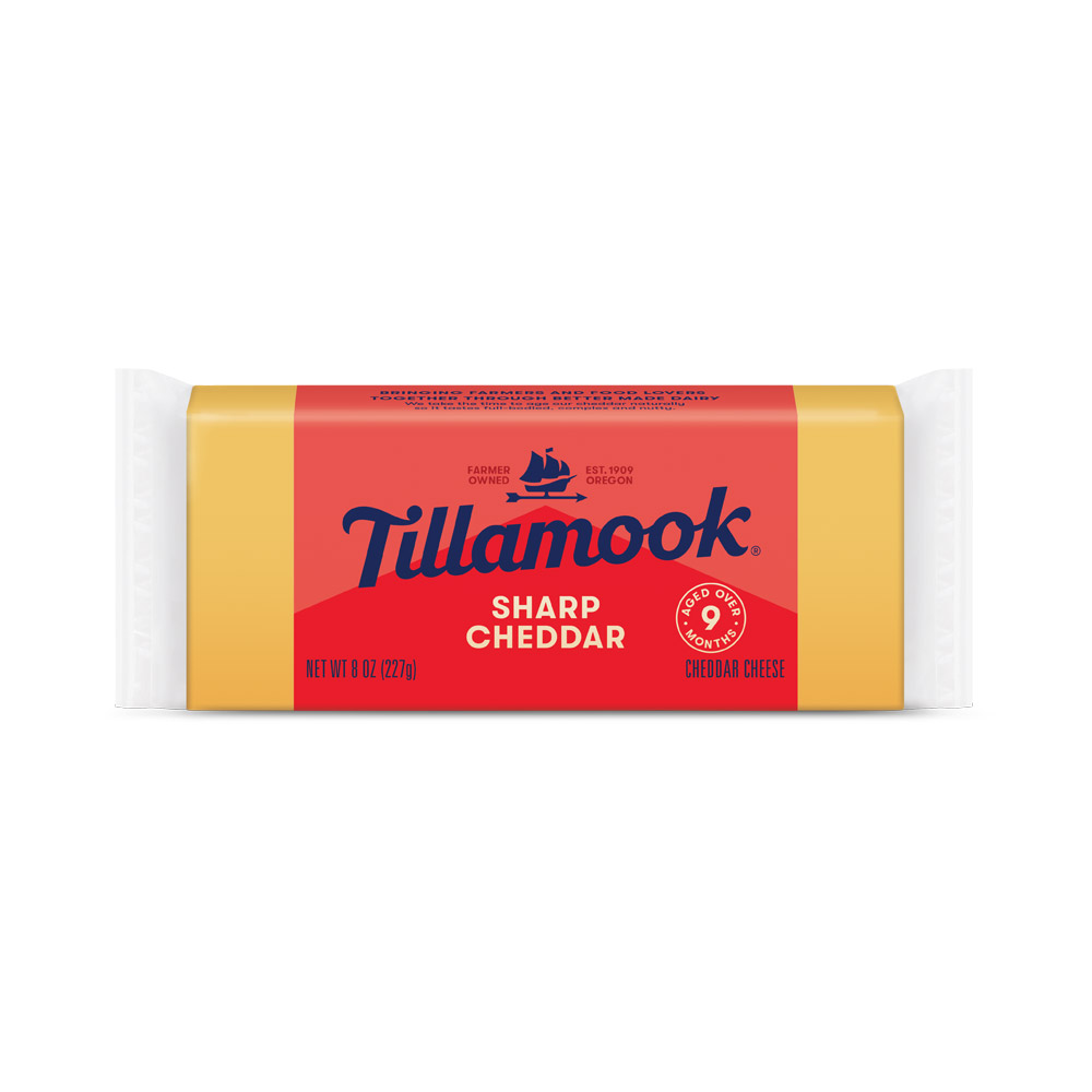 A bar of Tillamook sharp cheddar cheese