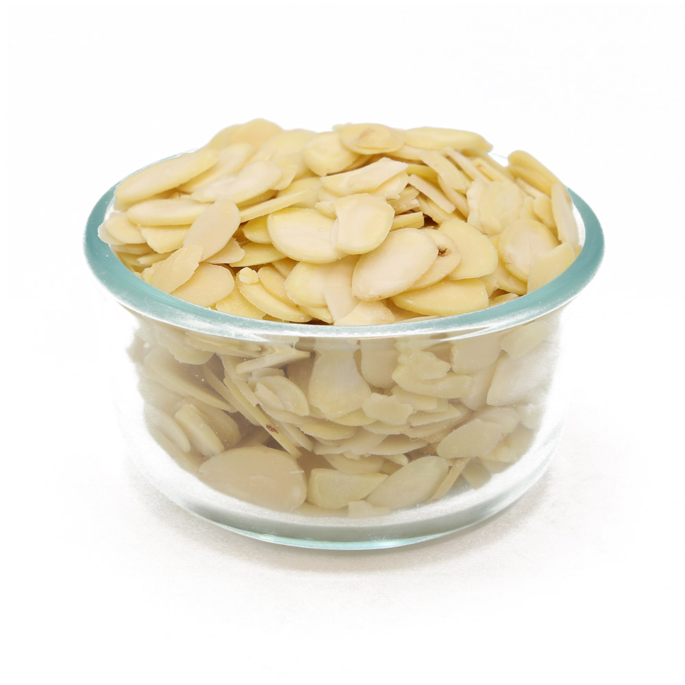 A bowl of sliced raw skin-off almonds