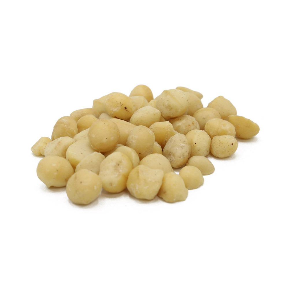 A pile of whole raw macadamia nuts