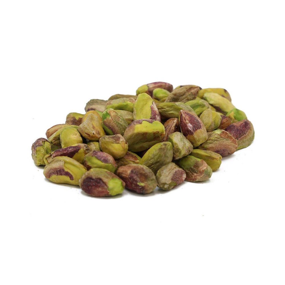 A pile of shelled raw pistachios