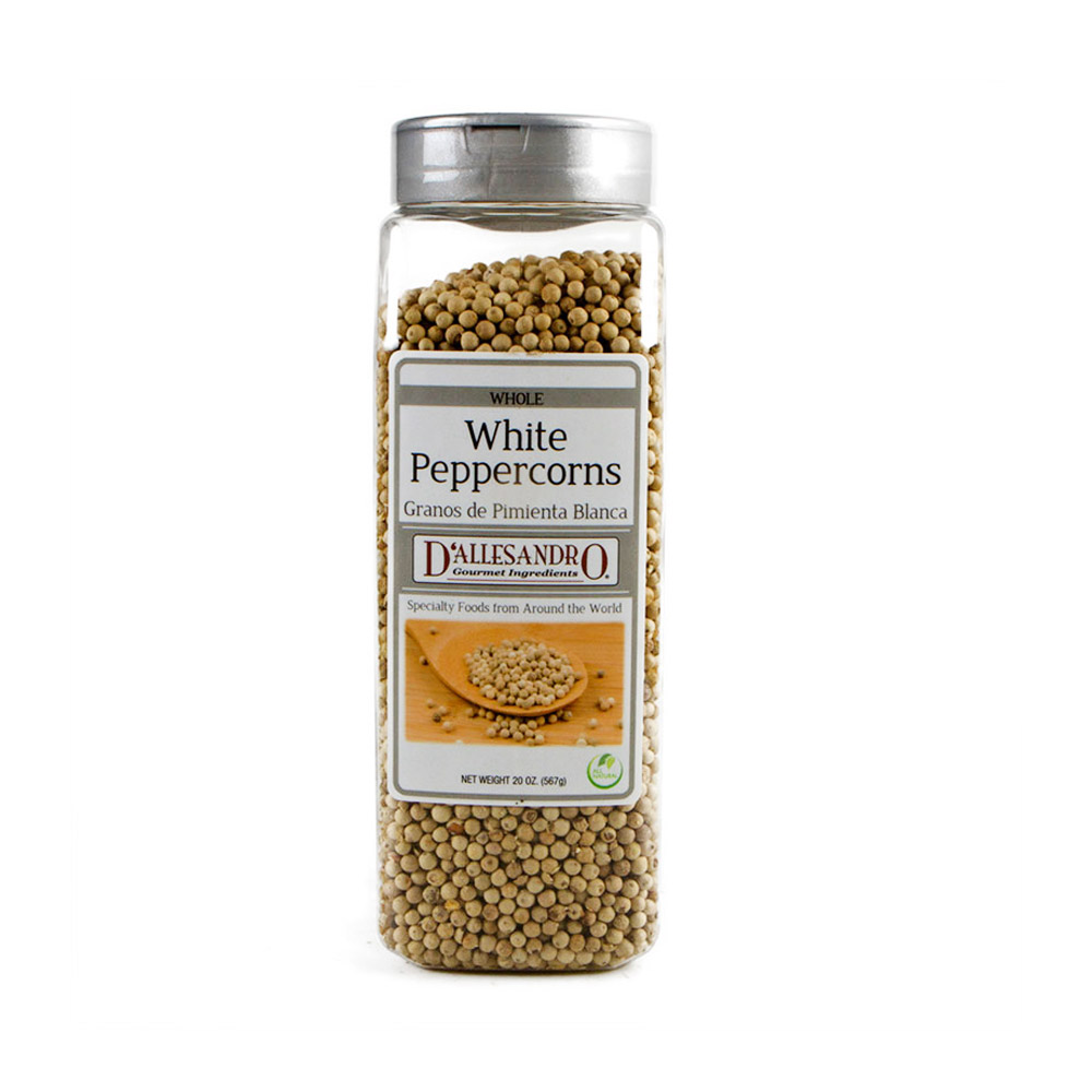 A container of white peppercorns