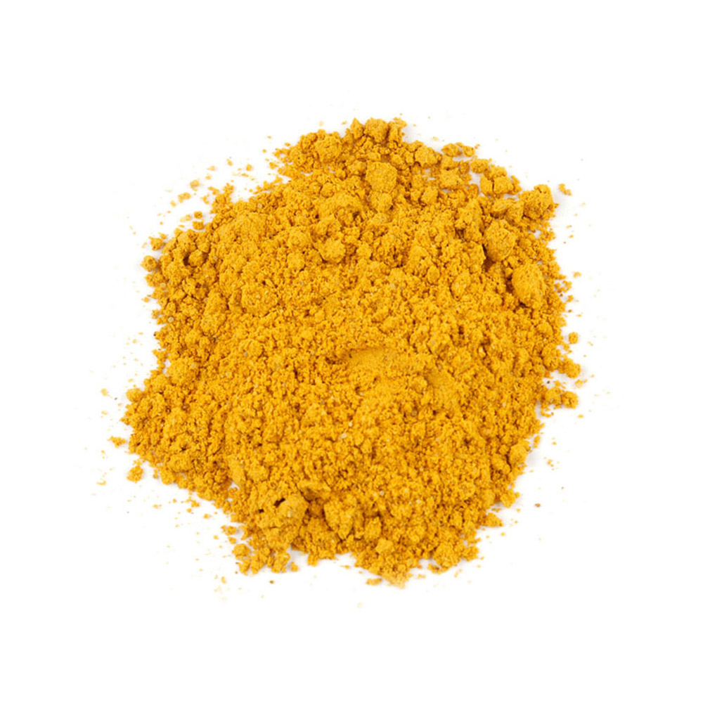 A pile of Madras style yellow curry powder