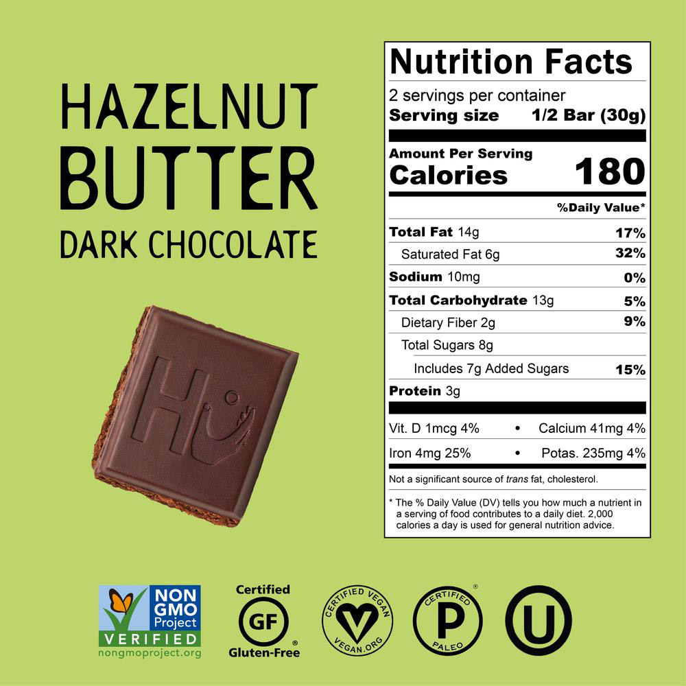 A square of a Hu chocolate bar next to nutritional information and bar attributes
