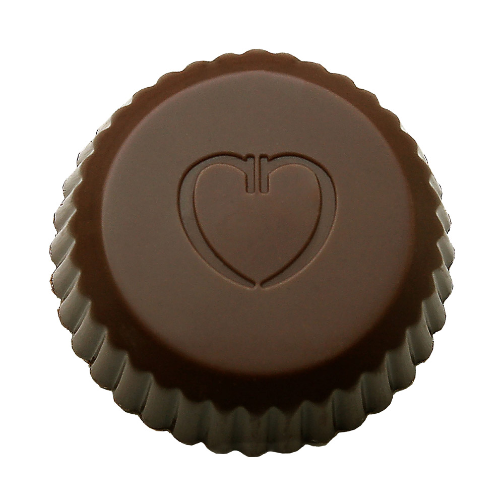 A single Chocolove Dark Chocolate Almond Butter Cup unwrapped