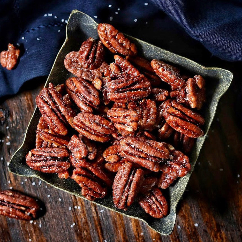 A bowl of Nutkrack Classic Candied Pecans