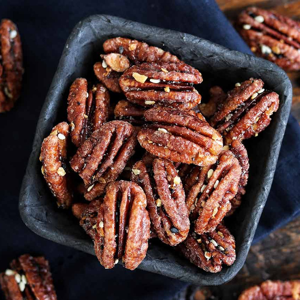 A bowl of Nutkrack Everything Candied Pecans