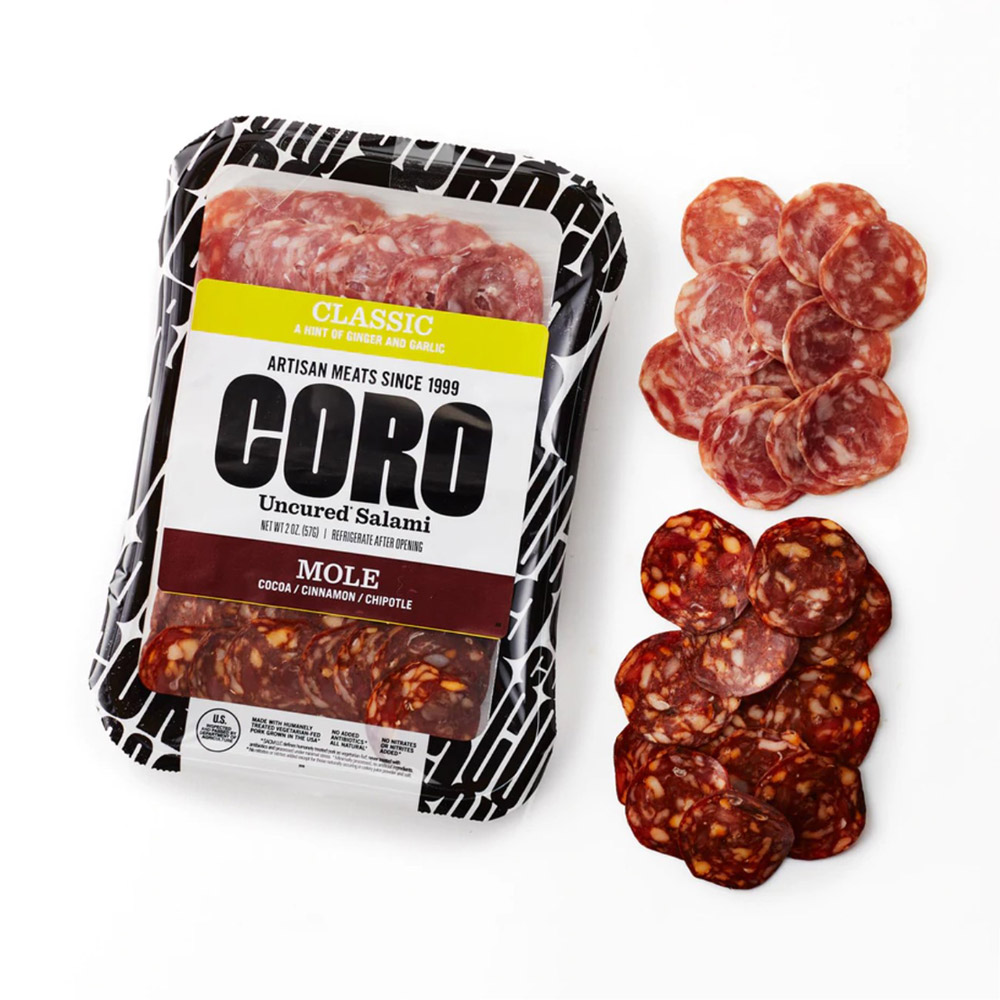 A package of Coro salami next to a pile of salami slices