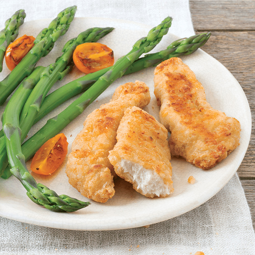 applegate naturals homestyle breaded chicken breast tenders cooked on plate with vegetables