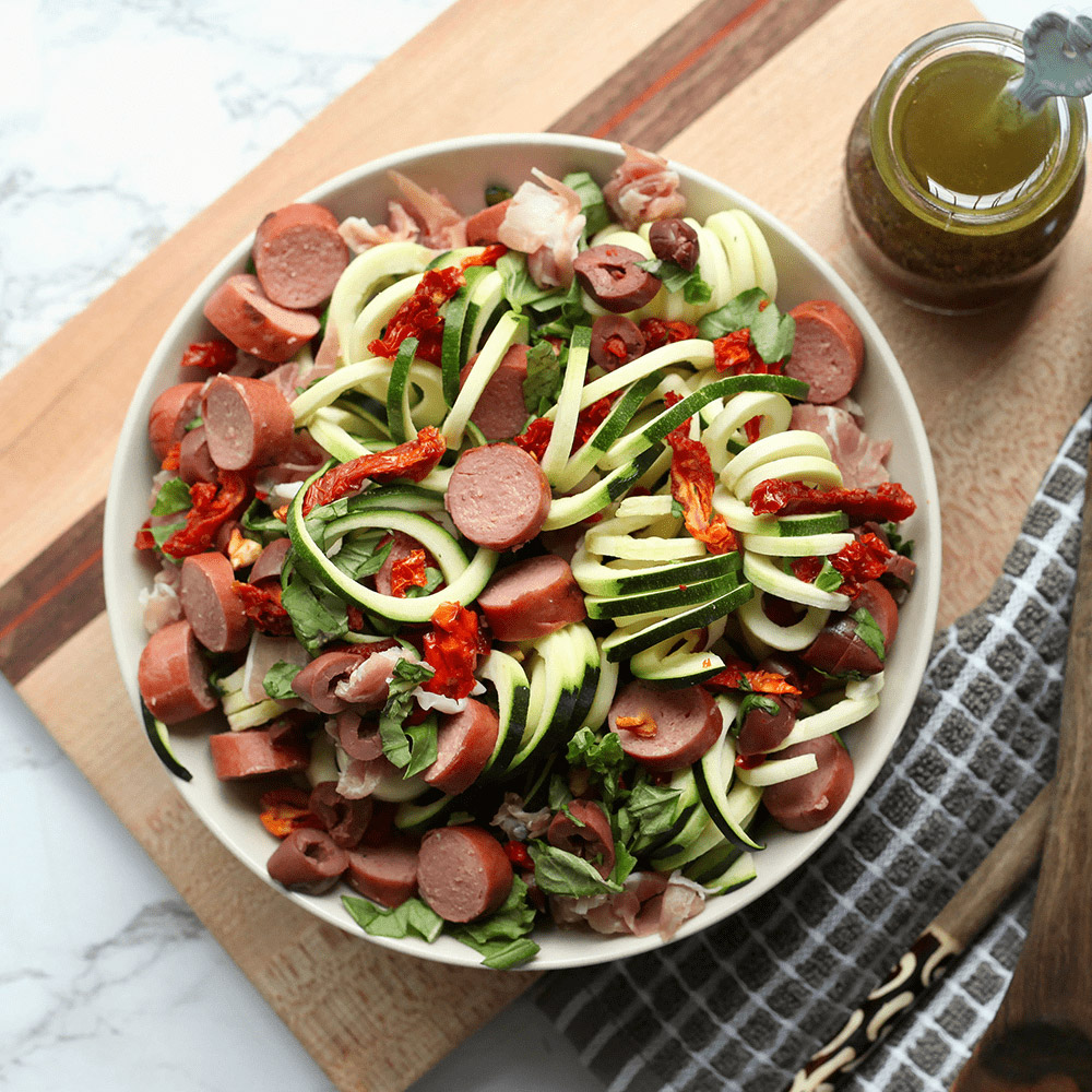 applegate organics the great organic uncured beef hot dog sliced in salad with cucumbers and onions and peppers