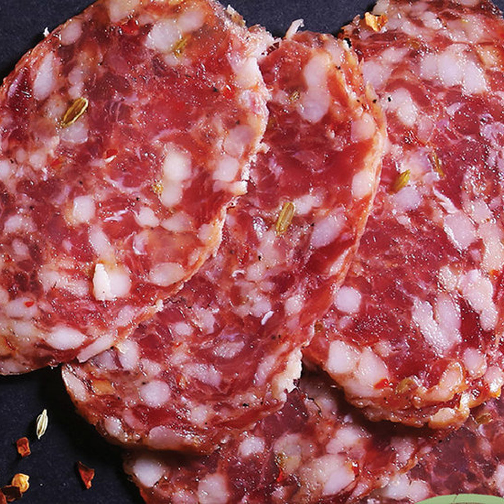 red bear del toro chorizo dry salami sliced on cutting board