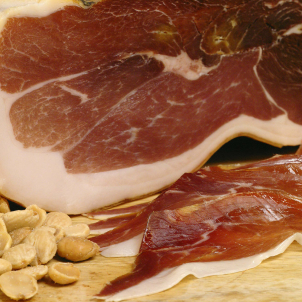 mitica serrano ham sliced on table