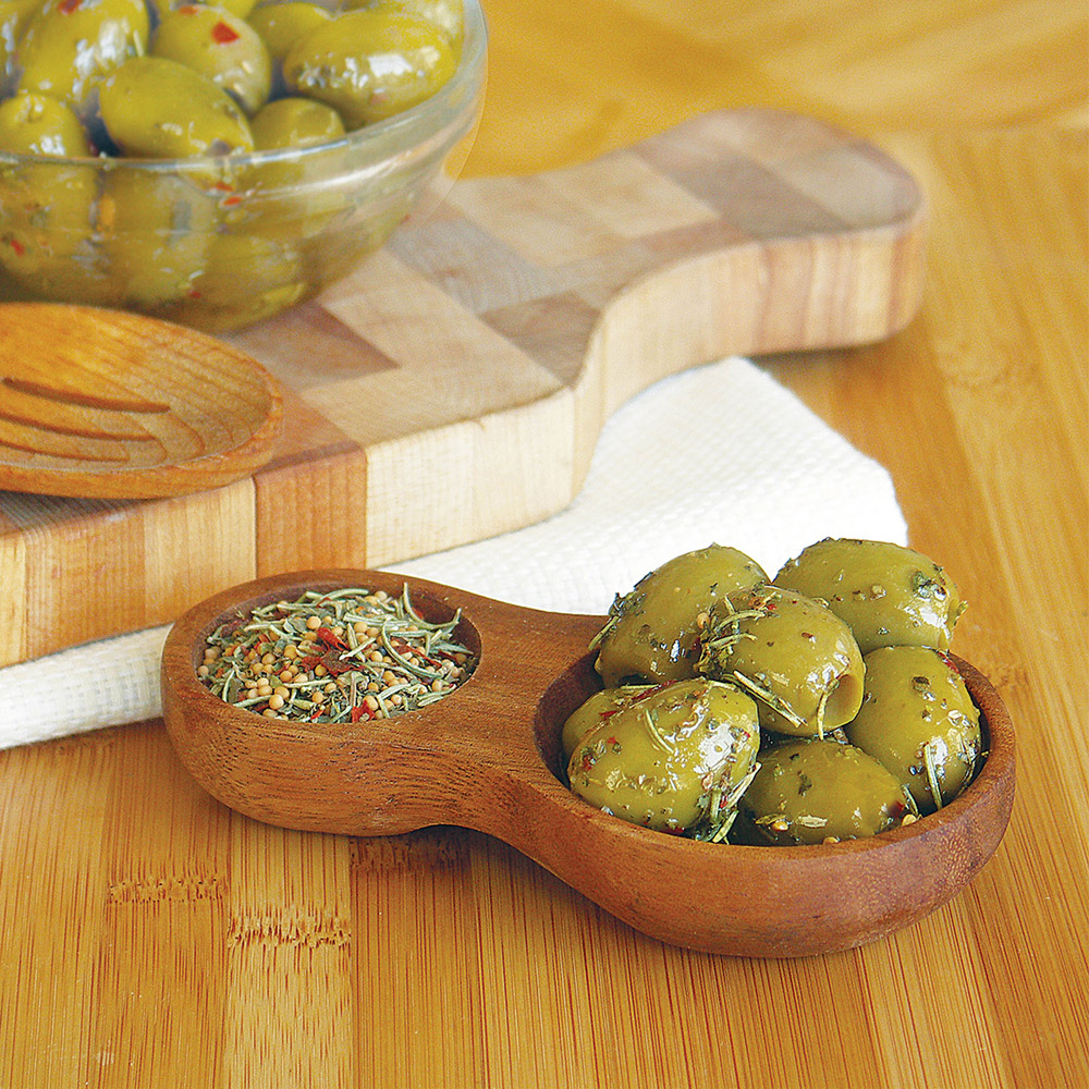 divina pitted sicilian herb marinated mt. athos green olives in bowl with spices
