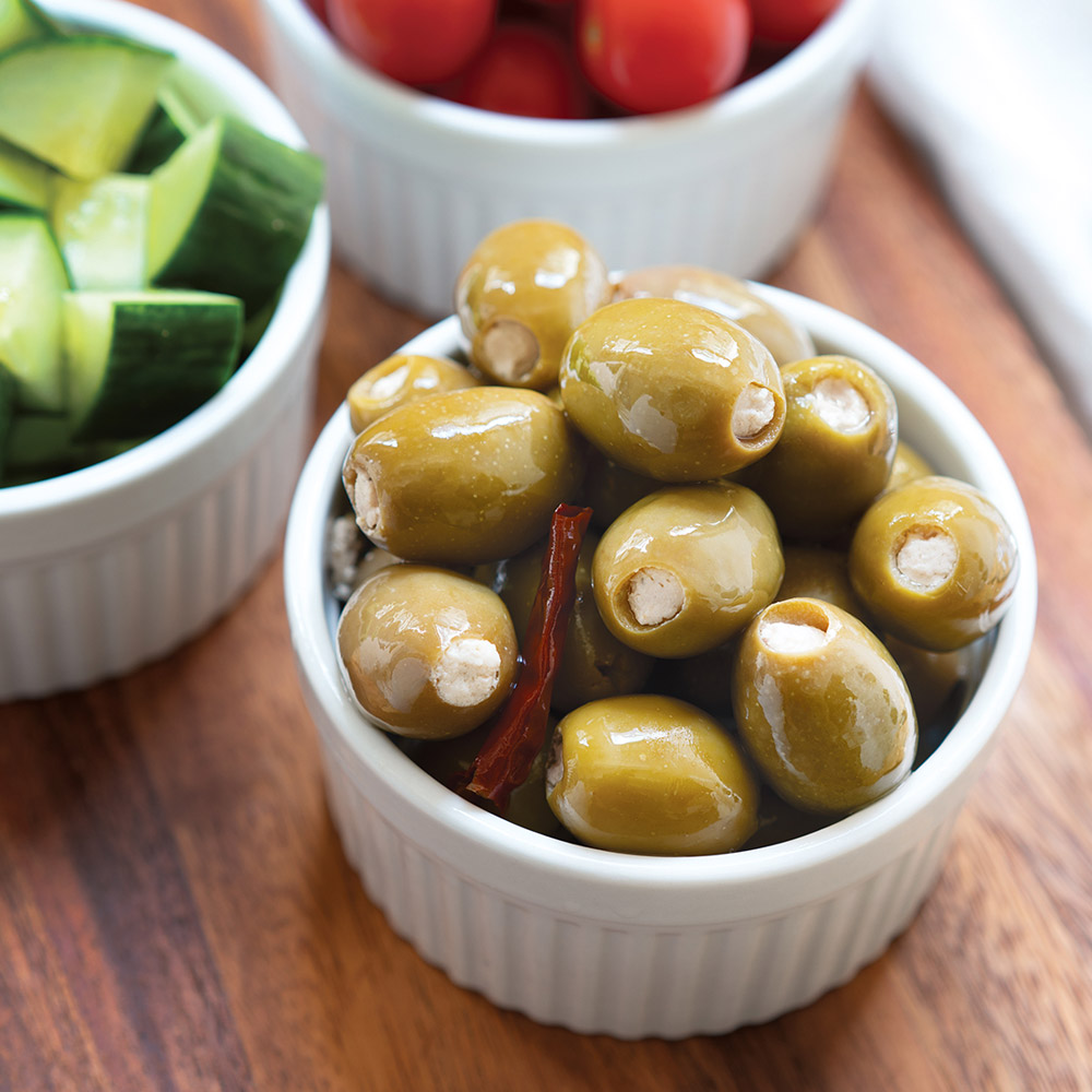 divina mt. athos green olives stuffed with feta in bowl