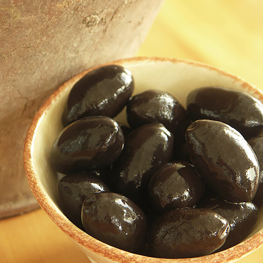 Divina Black Cerignola Olives in a bowl