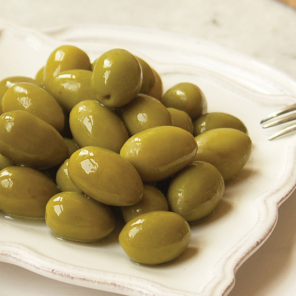 Lamedina picholine olives on a plate with fork