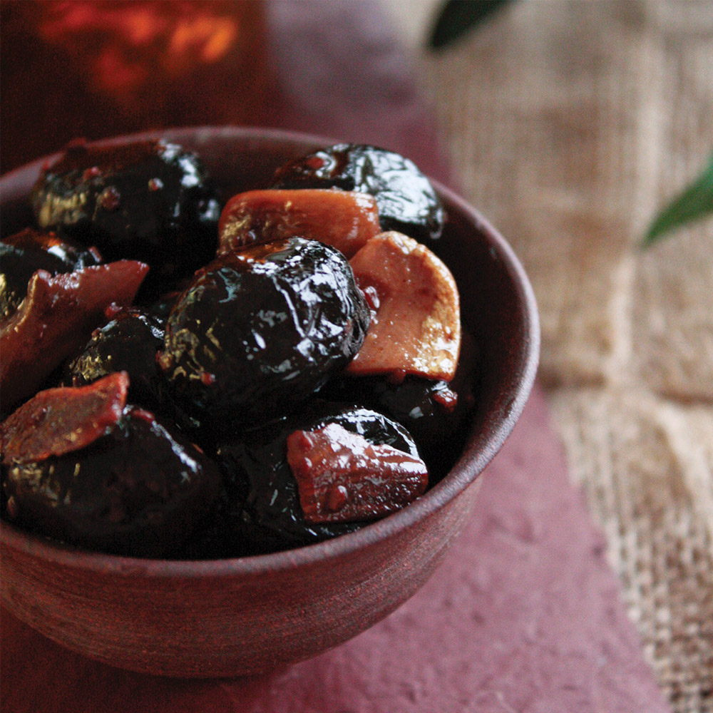 A bowl of Barnier Dry-Cured Black Olives with Garlic