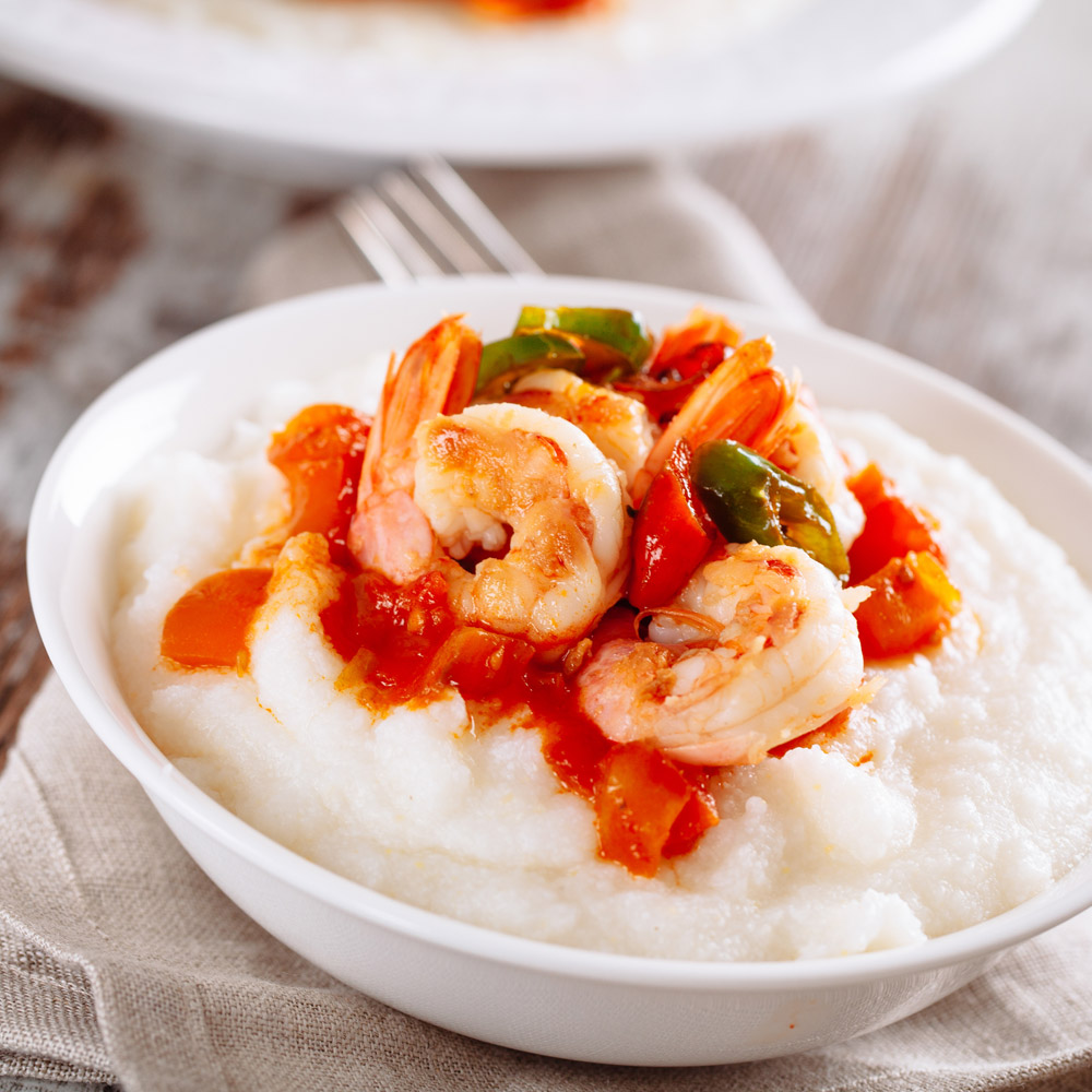 A bowl of shrimp and grits