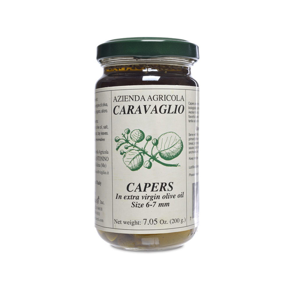 Jar of caravaglio sicilian capers in olive oil and herbs