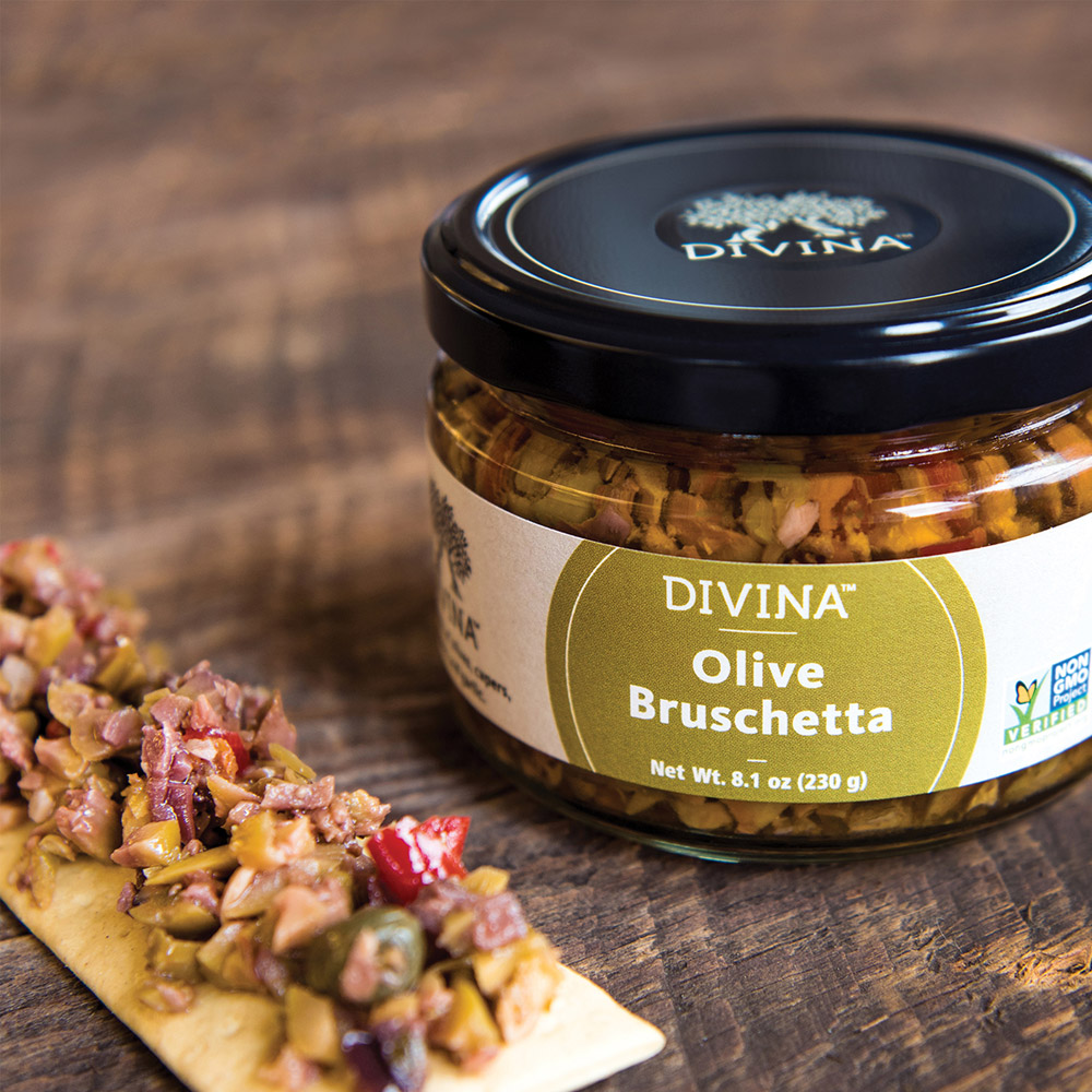 Divina olive bruschetta on cracker and in jar