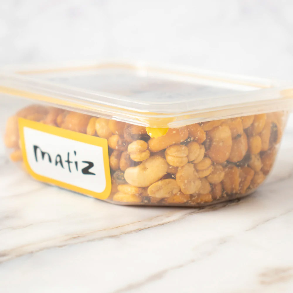 The side view of a container of Matiz Spanish Cocktail Mix with Olives