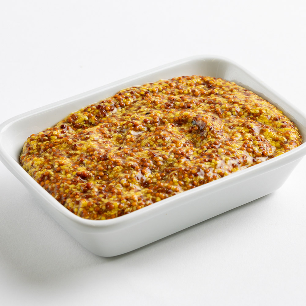 A bowl of Domaine des Vignes Whole Grain Mustard
