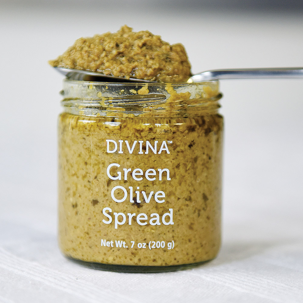 divina green olive spread in jar with spoon