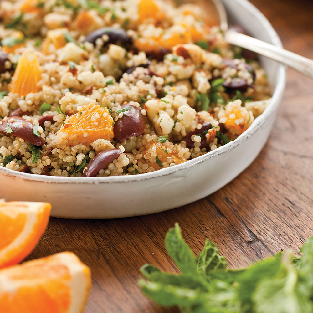 divina pitted organic kalamata olives in bowl with quinoa and more