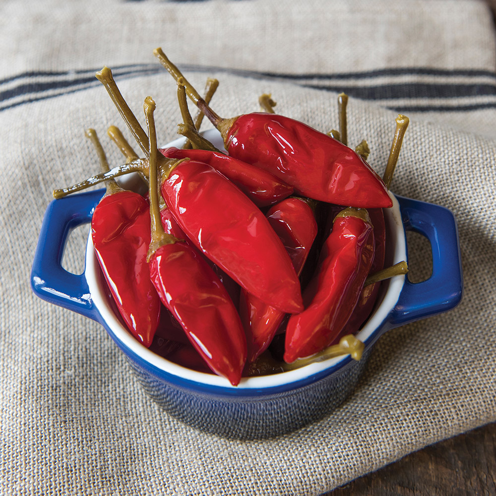 divina calabrian peppers in blue bowl