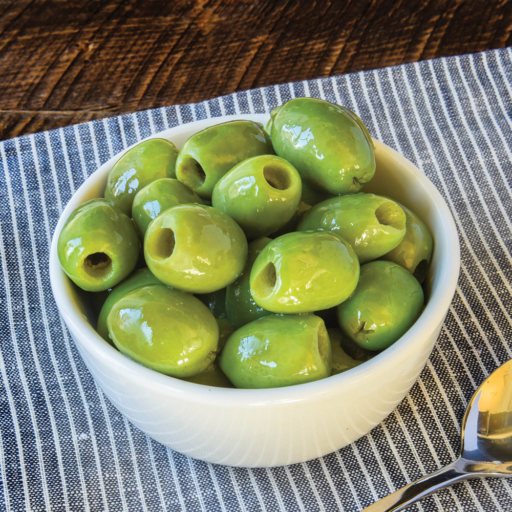 A bowl of Divina pitted Frescatrano olives