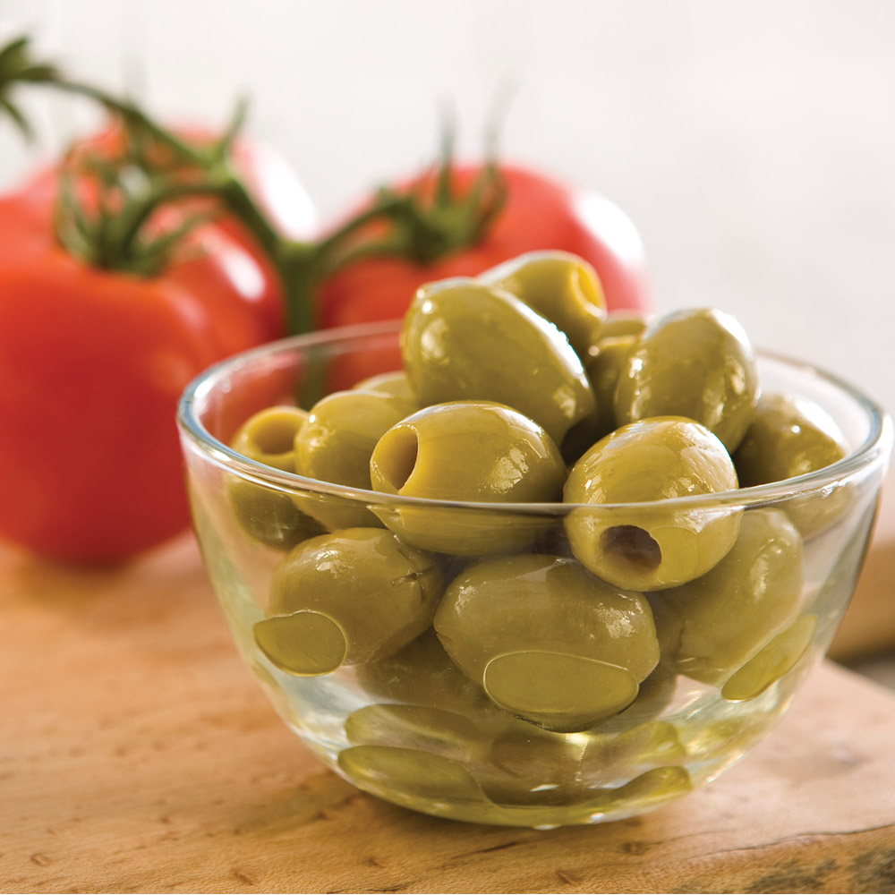 divina pitted italian green olives in bowl