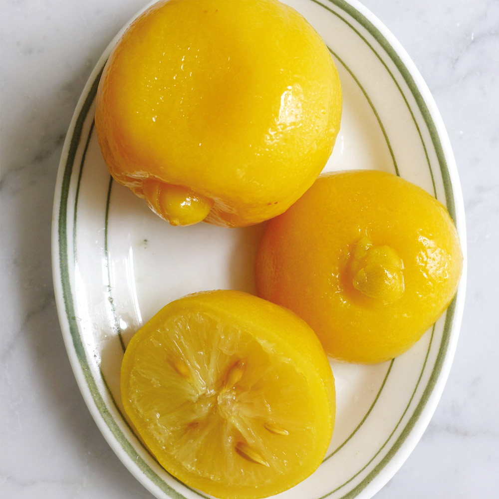 Three beldi lemons on a plate