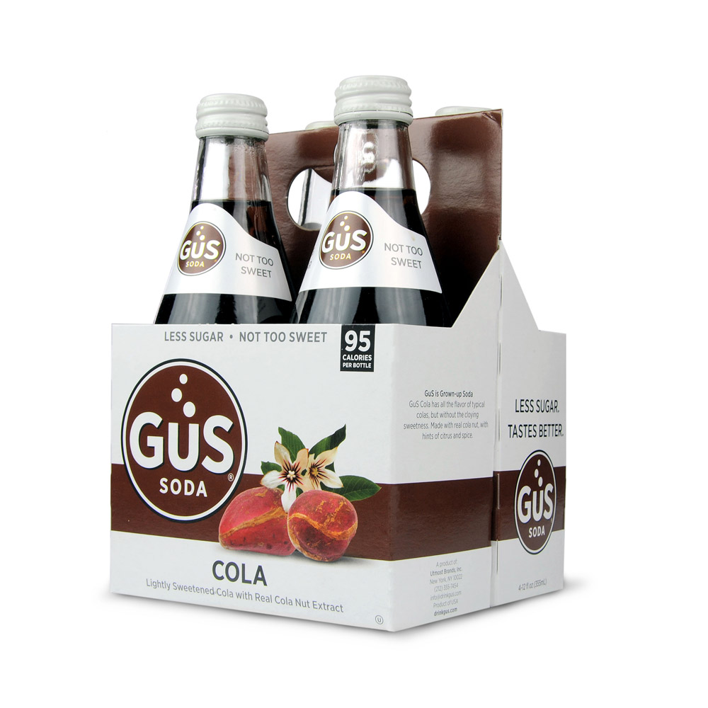 Four pack of bottles of GUS soda cola